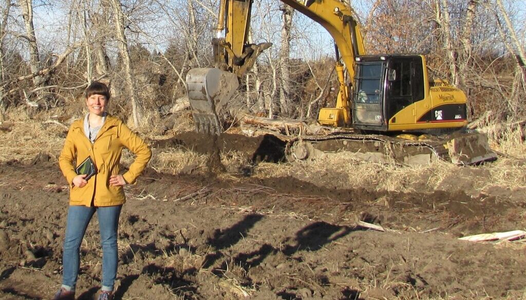 Heather Barber with excavator at Skalkaho Bend Park