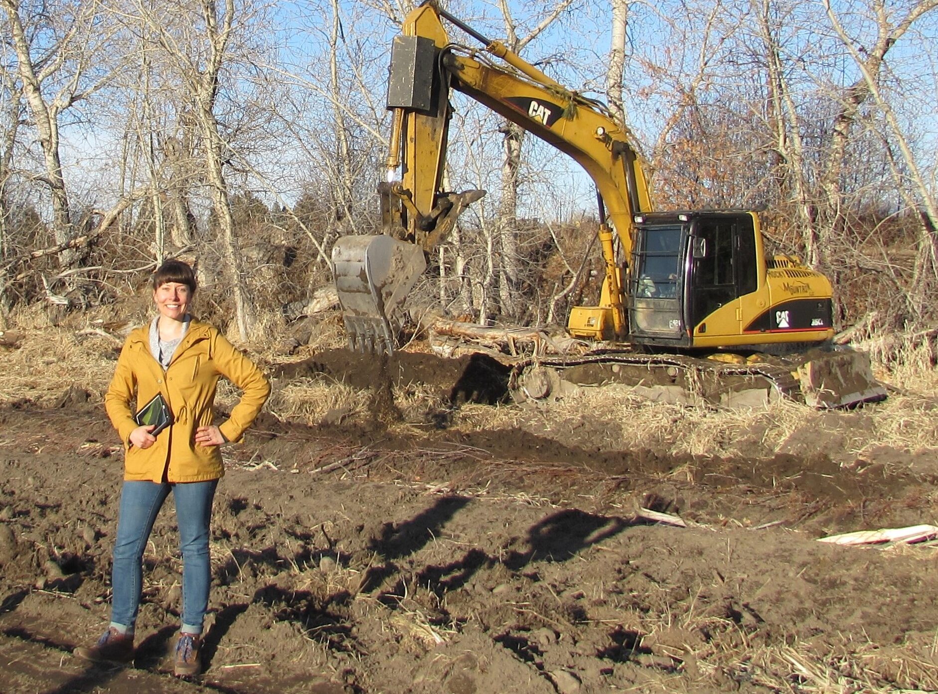 Heather Barber with excavator at Skalkaho Bend Park